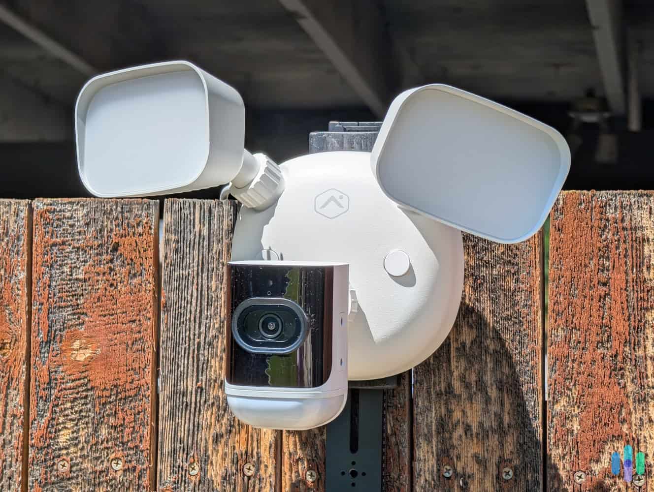 Frontpoint premium floodlight camera on fence